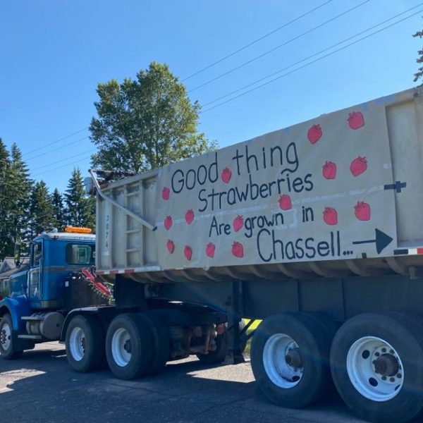 Strawberry parade-dump trailer